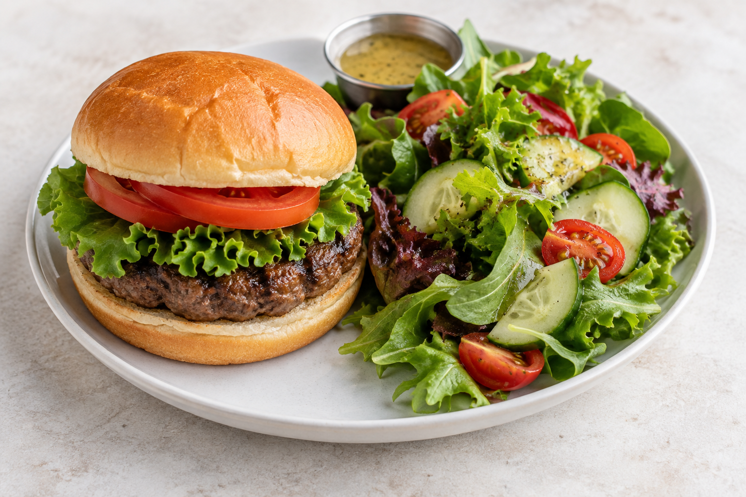 Burger with a green side salad